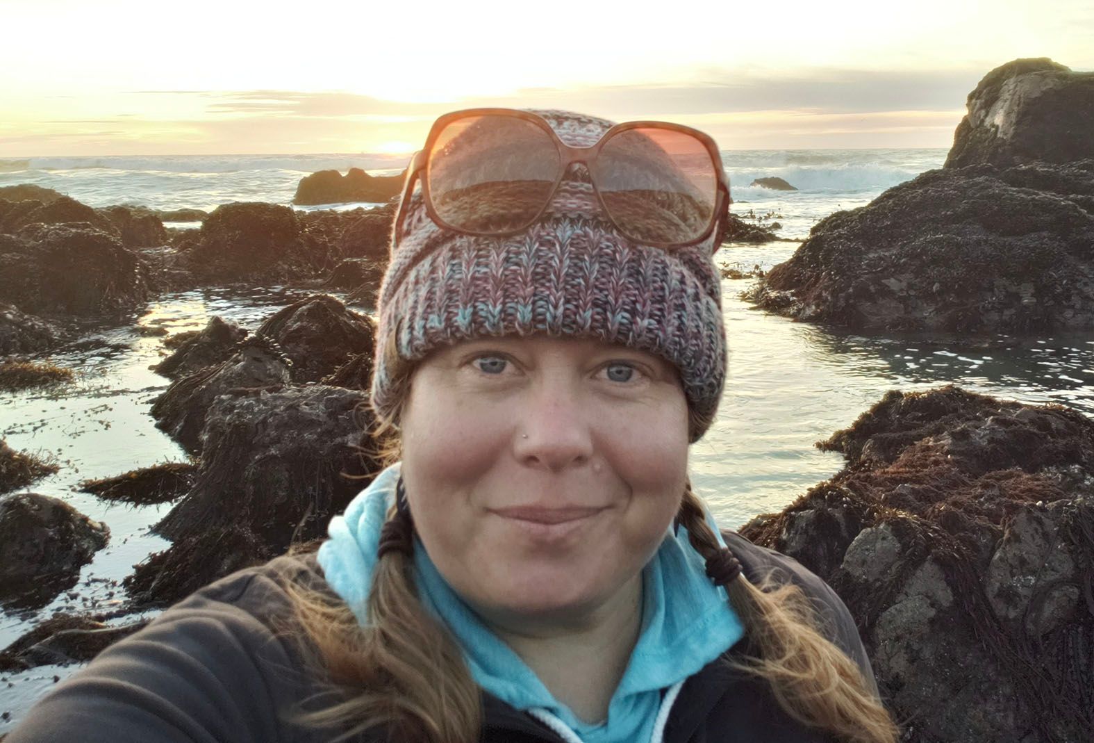 Photograph of Alison Young Standing in front of tide pools